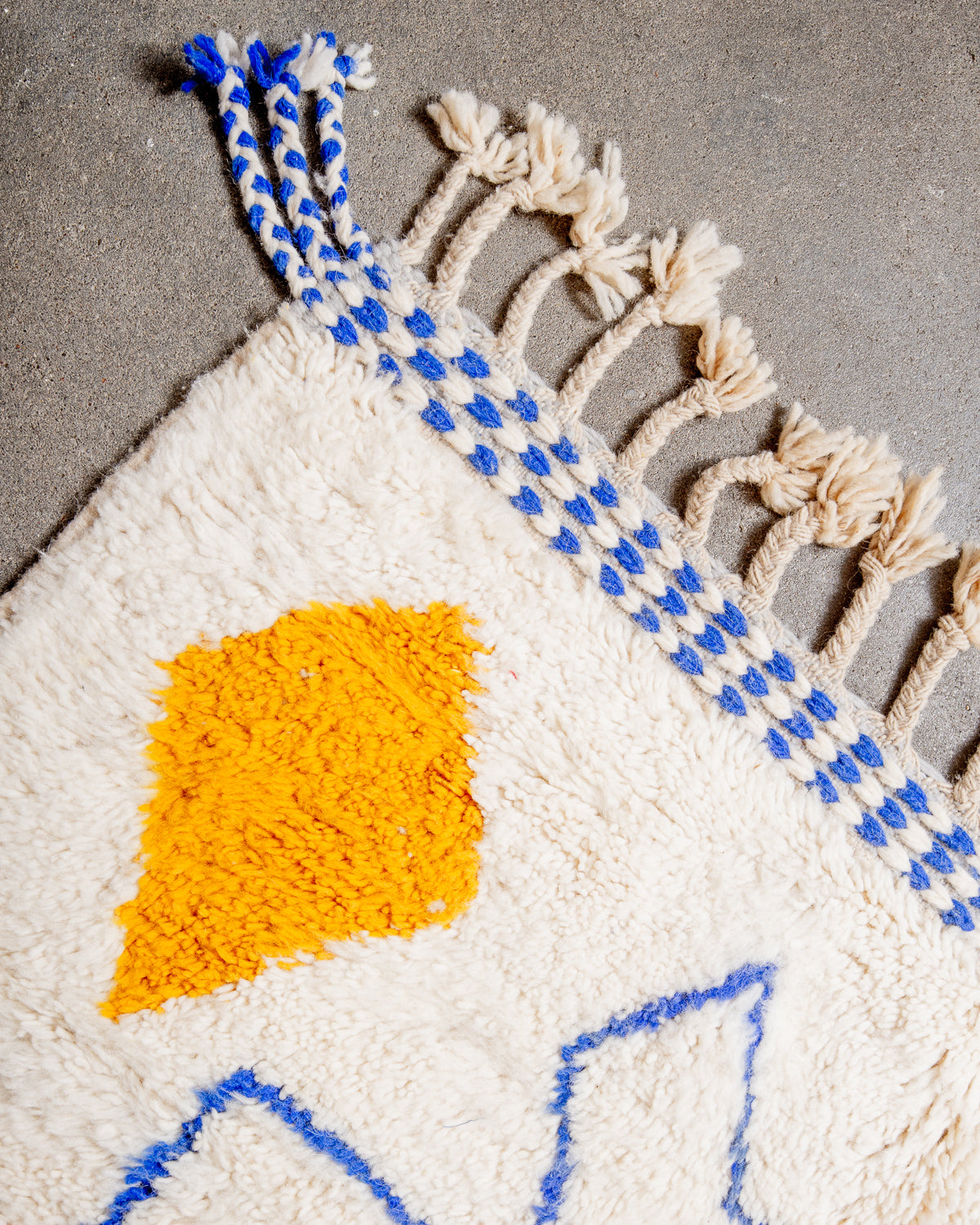 Modern, designer, handcrafted Berber rug from Morocco. Beniourain carpet with beautiful colours and patterns and fluffy wool texture.